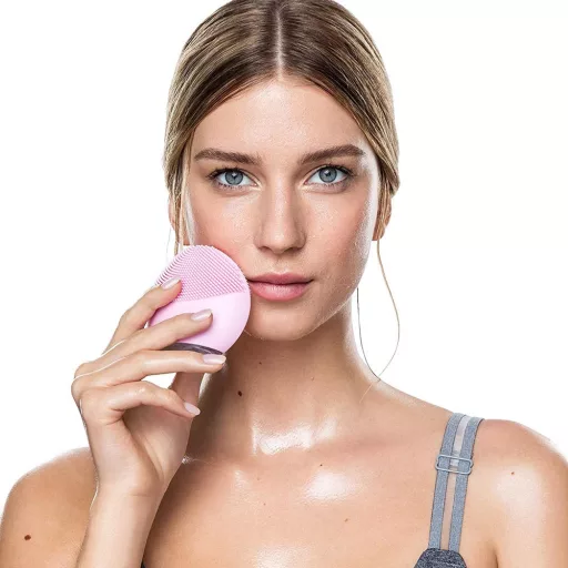 Aparat electric pentru masaj facial-roz